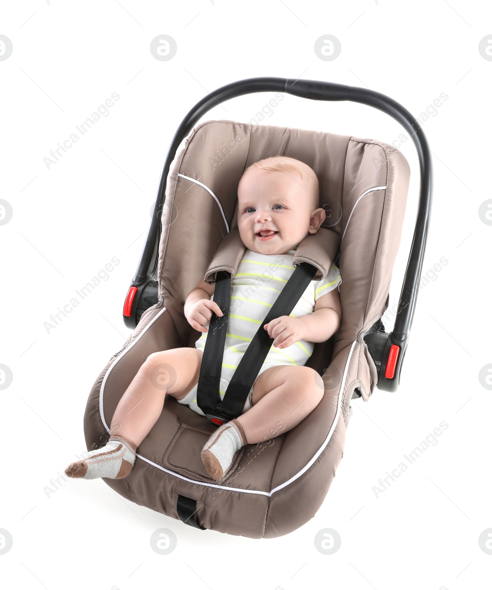 Photo of Adorable baby in child safety seat on white background