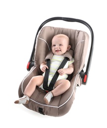 Photo of Adorable baby in child safety seat on white background