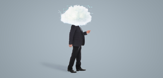Mature man with cloud on his head against grey background. Modern storage technology concept