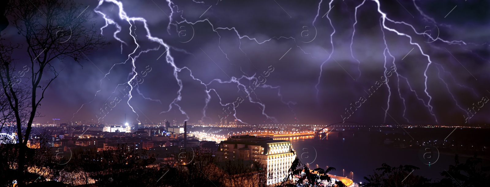 Image of Dark cloudy sky with lightning over city, banner design. Stormy weather