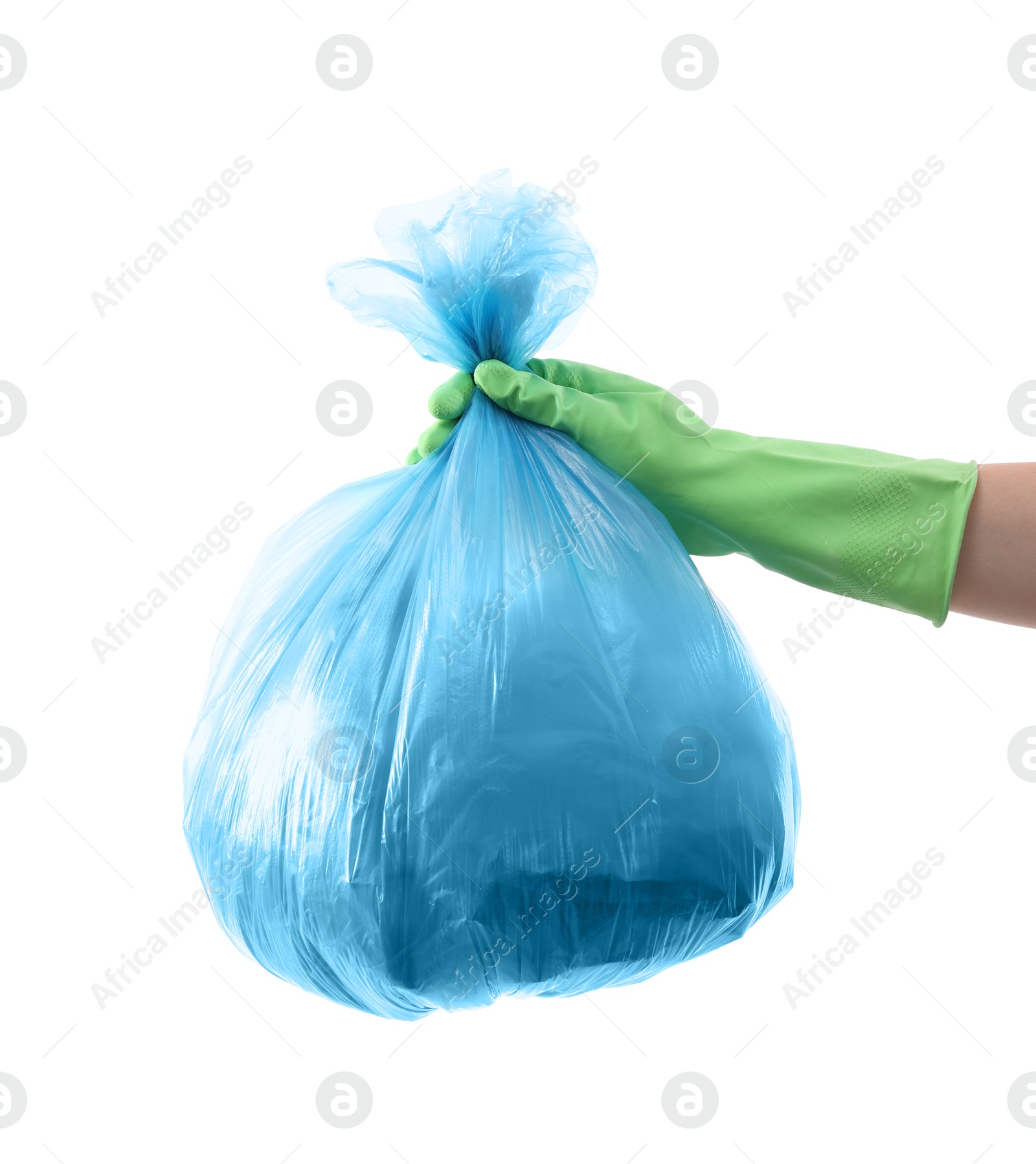 Photo of Woman holding plastic bag full of garbage on white background, closeup