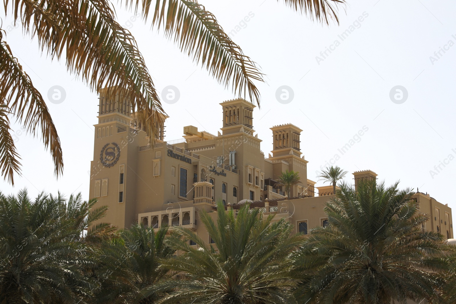 Photo of SHARJAH, UNITED ARAB EMIRATES - NOVEMBER 04, 2018: Beautiful landscape with Sheraton resort on sunny day