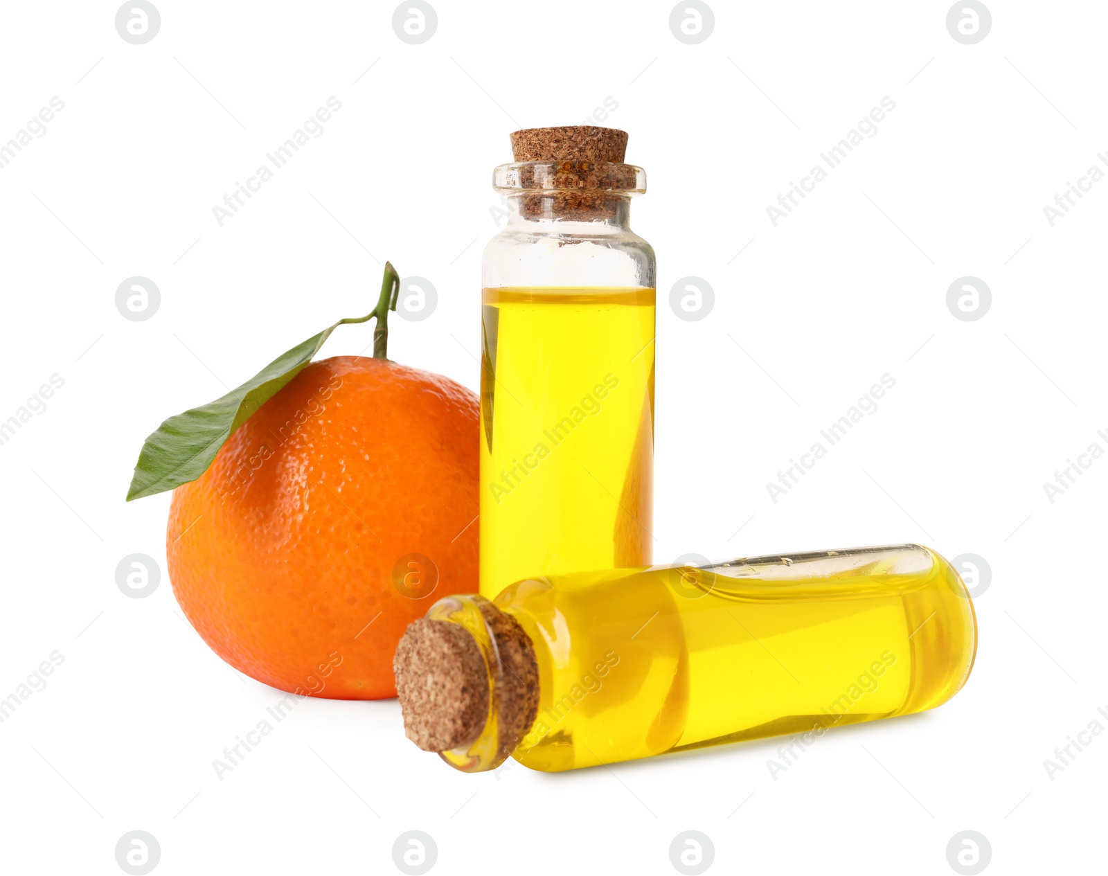 Photo of Aromatic tangerine essential oil in bottles and citrus fruit isolated on white