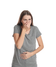 Photo of Woman suffering from nausea on white background. Food poisoning