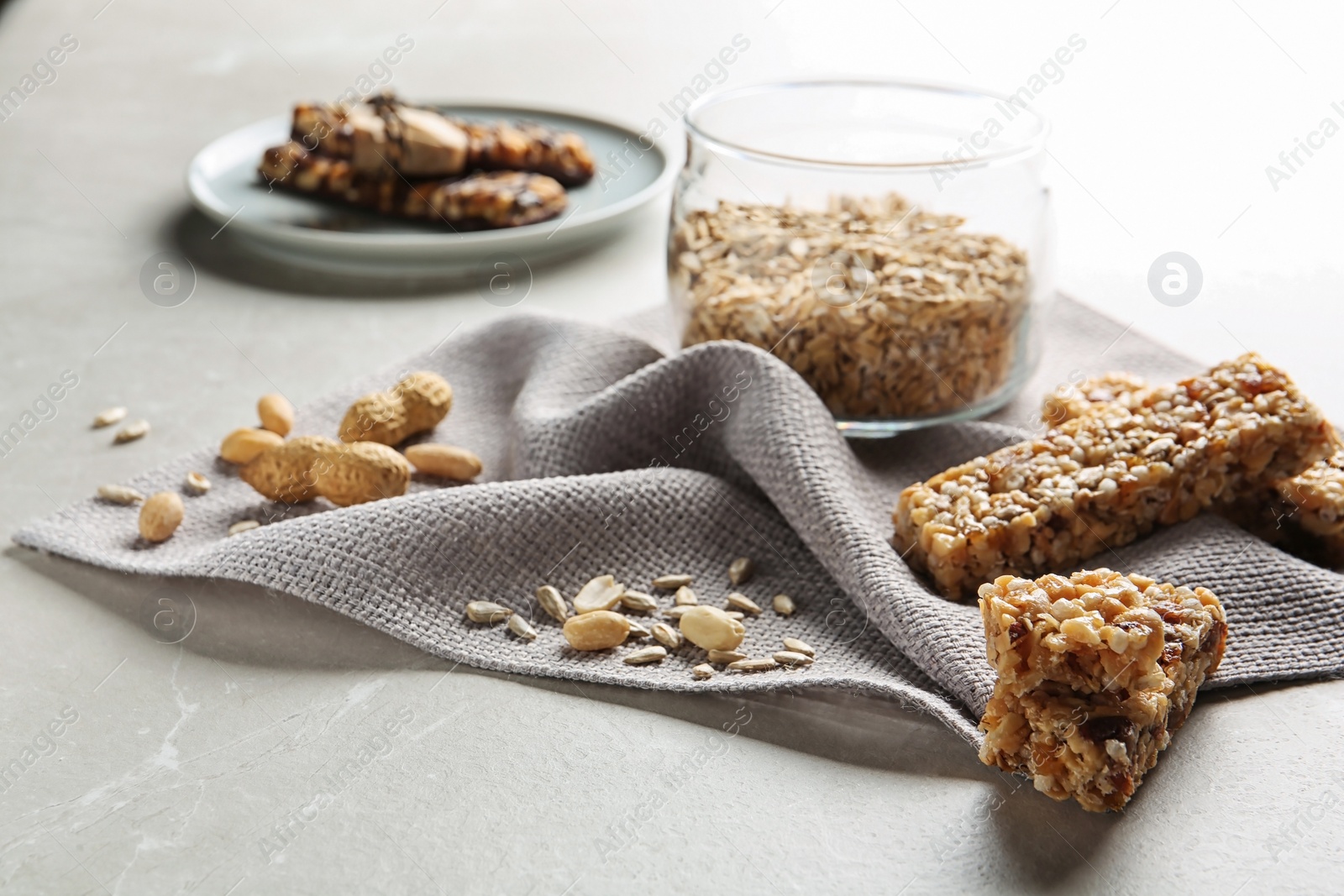 Photo of Homemade grain cereal bar on table. Healthy snack