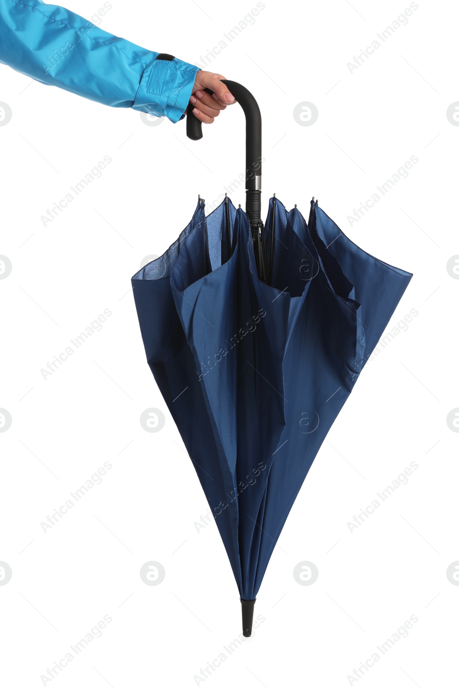 Photo of Woman with closed blue umbrella on white background, closeup