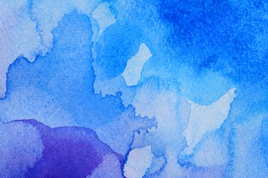Photo of Abstract blue watercolor painting as background, top view