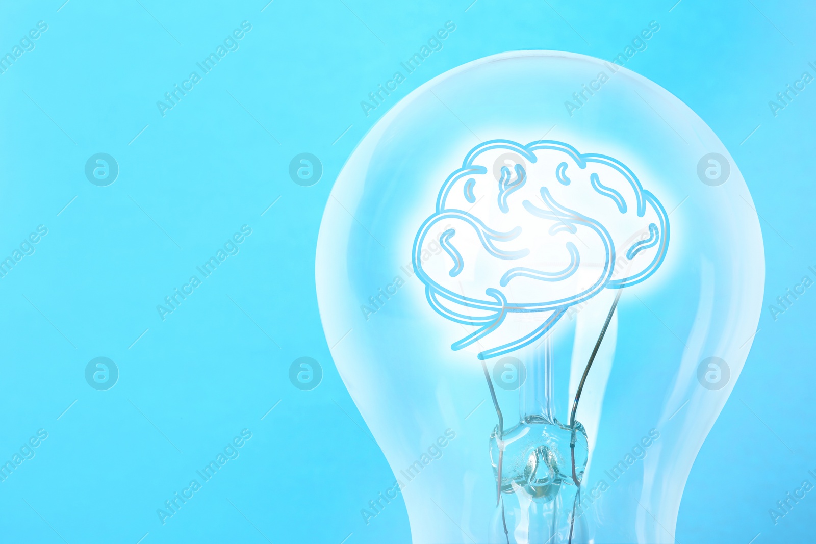 Image of Lamp bulb with human brain inside on light blue background, space for text. Idea generation