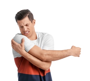 Photo of Young man suffering from pain in shoulder on white background