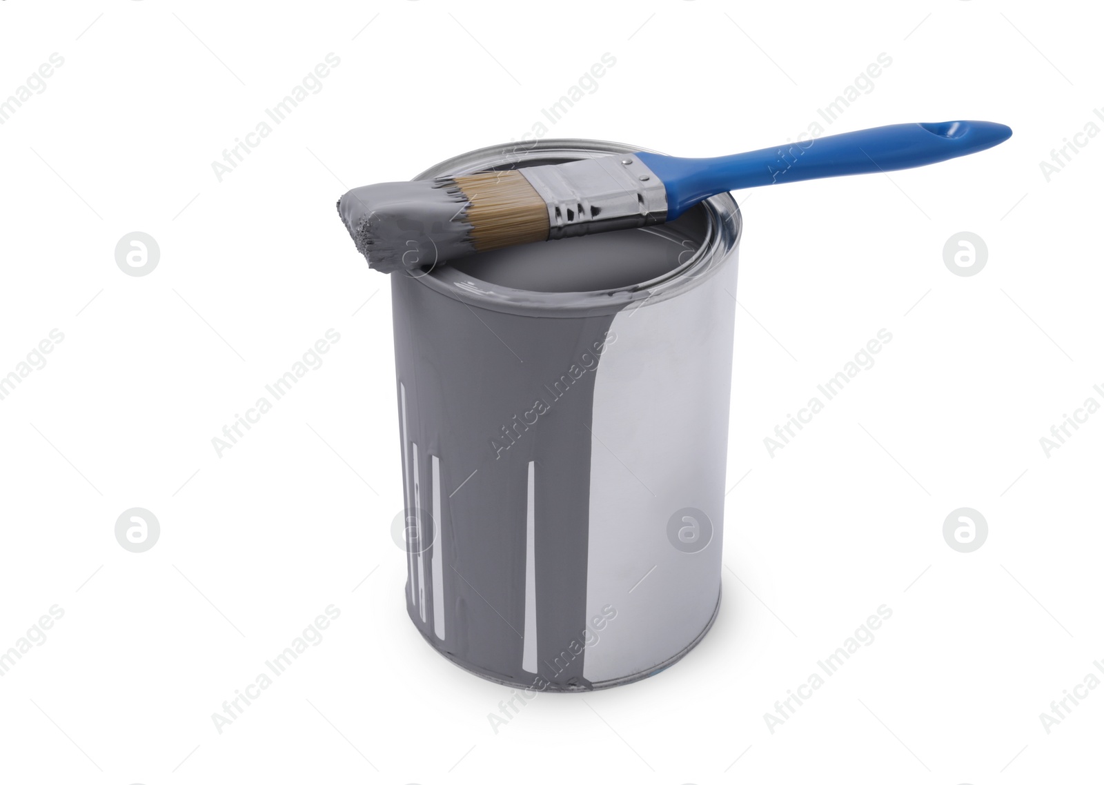 Photo of Can with grey paint and brush on white background