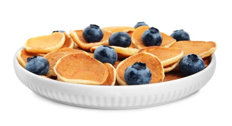 Delicious mini pancakes cereal with blueberries on white background