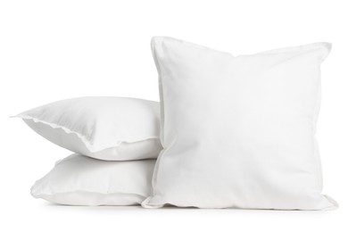 Photo of Three new soft pillows isolated on white