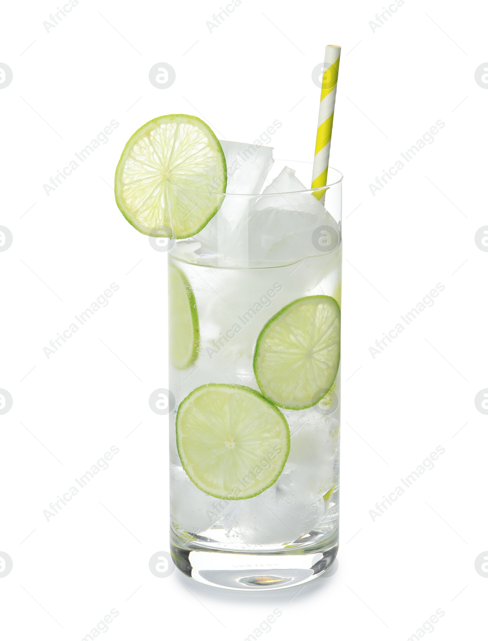 Photo of Glass of drink with lime and ice cubes isolated on white