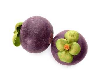 Photo of Delicious ripe mangosteen fruits on white background, top view