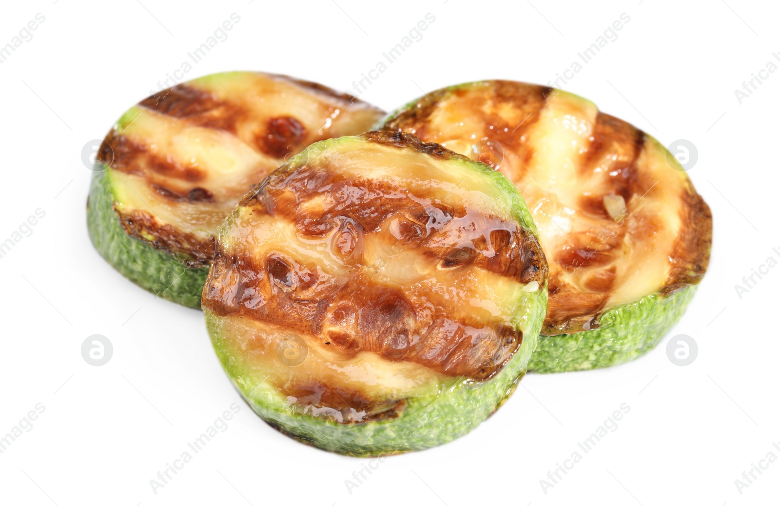 Photo of Slices of delicious grilled zucchini isolated on white