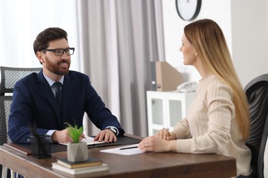 Woman having meeting with lawyer in office