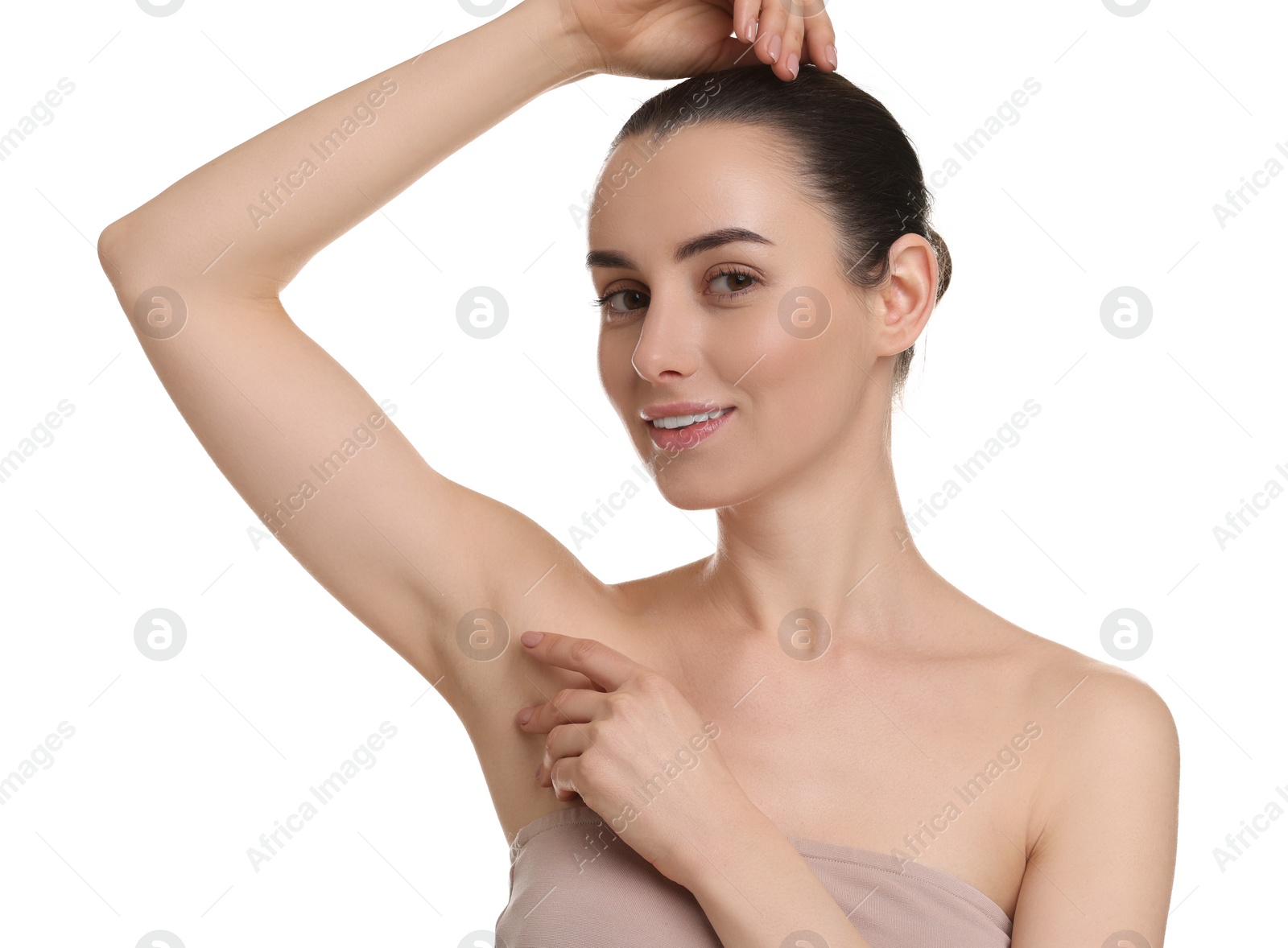 Photo of Beautiful woman showing armpit with smooth clean skin on white background