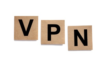 Paper notes with acronym VPN (Virtual Private Network) isolated on white, top view