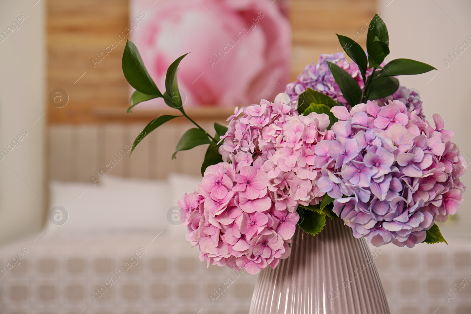 Photo of Bouquet of beautiful hydrangea flowers indoors, closeup. Interior design