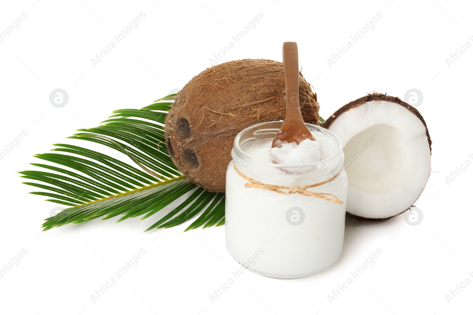 Photo of Composition with organic coconut oil on white background. Healthy cooking