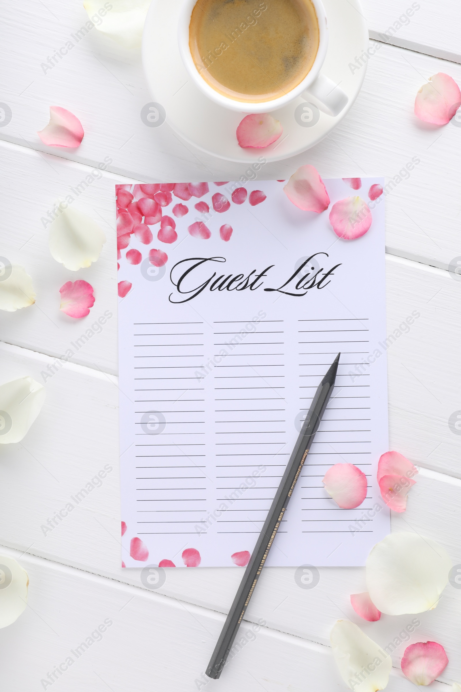 Photo of Guest list, pencil, coffee and petals on white wooden table, flat lay. Space for text