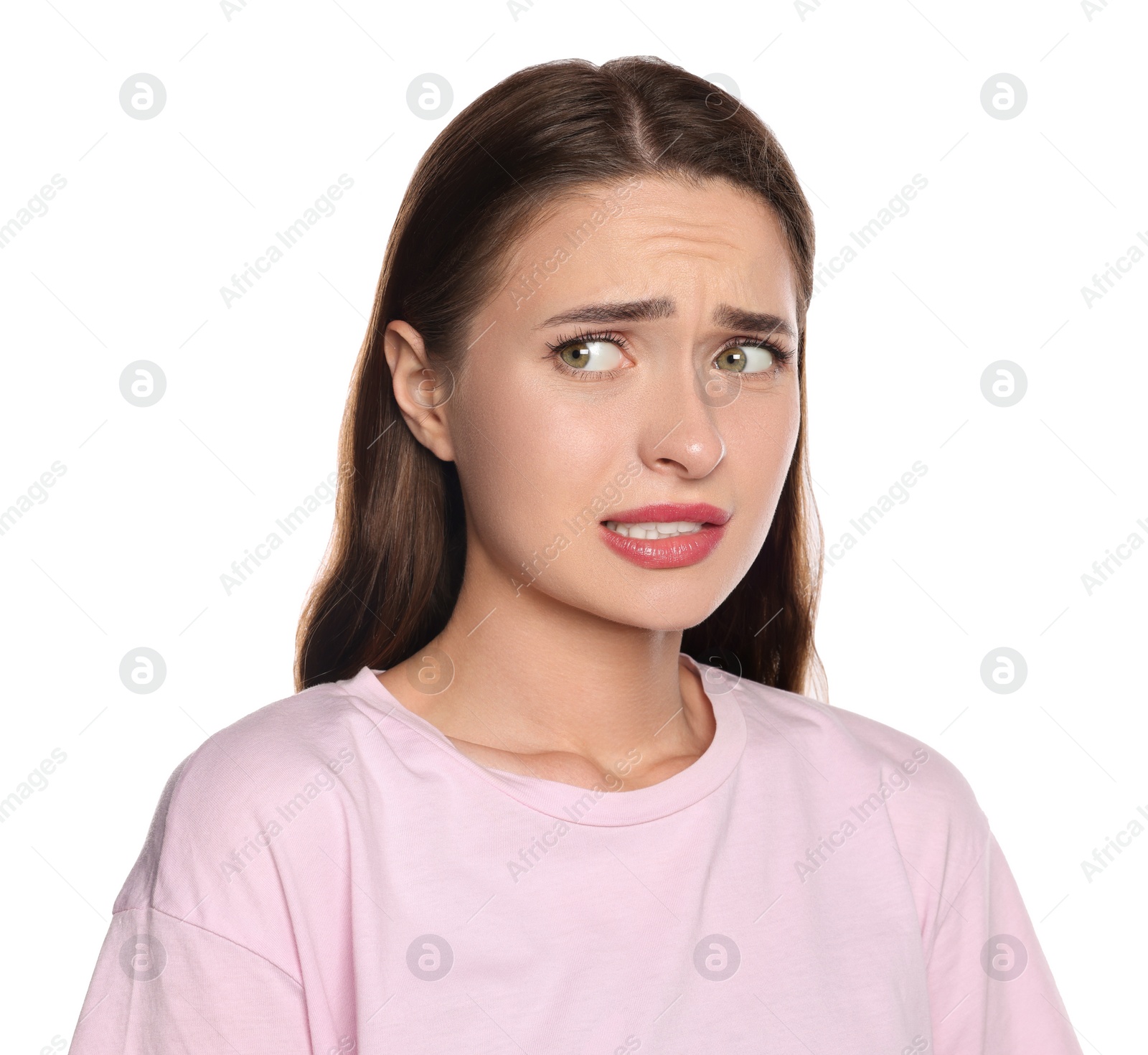 Photo of Embarrassed young woman in shirt on white background