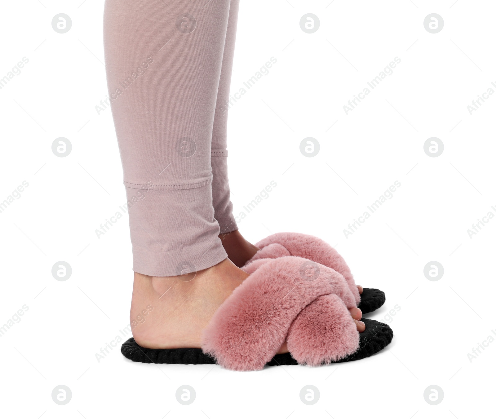 Photo of Woman in soft slippers on white background, closeup