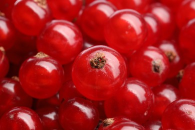 Photo of Many tasty fresh red currant berries as background, closeup