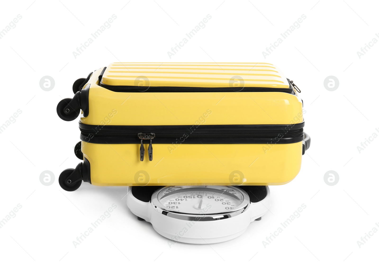 Photo of Weighing stylish suitcase on scales, white background