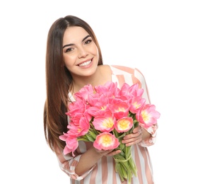 Photo of Portrait of smiling young girl with beautiful tulips on white background. International Women's Day