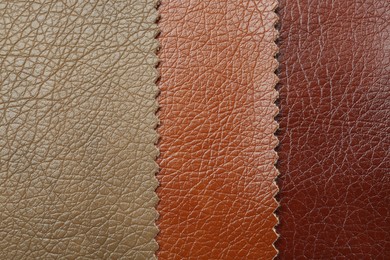 Texture of different leather as background, top view