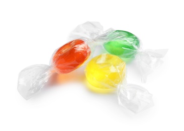 Photo of Different delicious colorful candies on white background