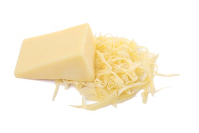 Photo of Grated and whole piece of cheese isolated on white