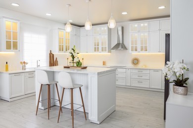 Photo of Luxury kitchen interior with new stylish furniture