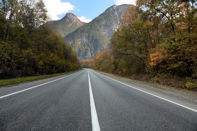 Empty asphalt road in mountains. Picturesque landscape