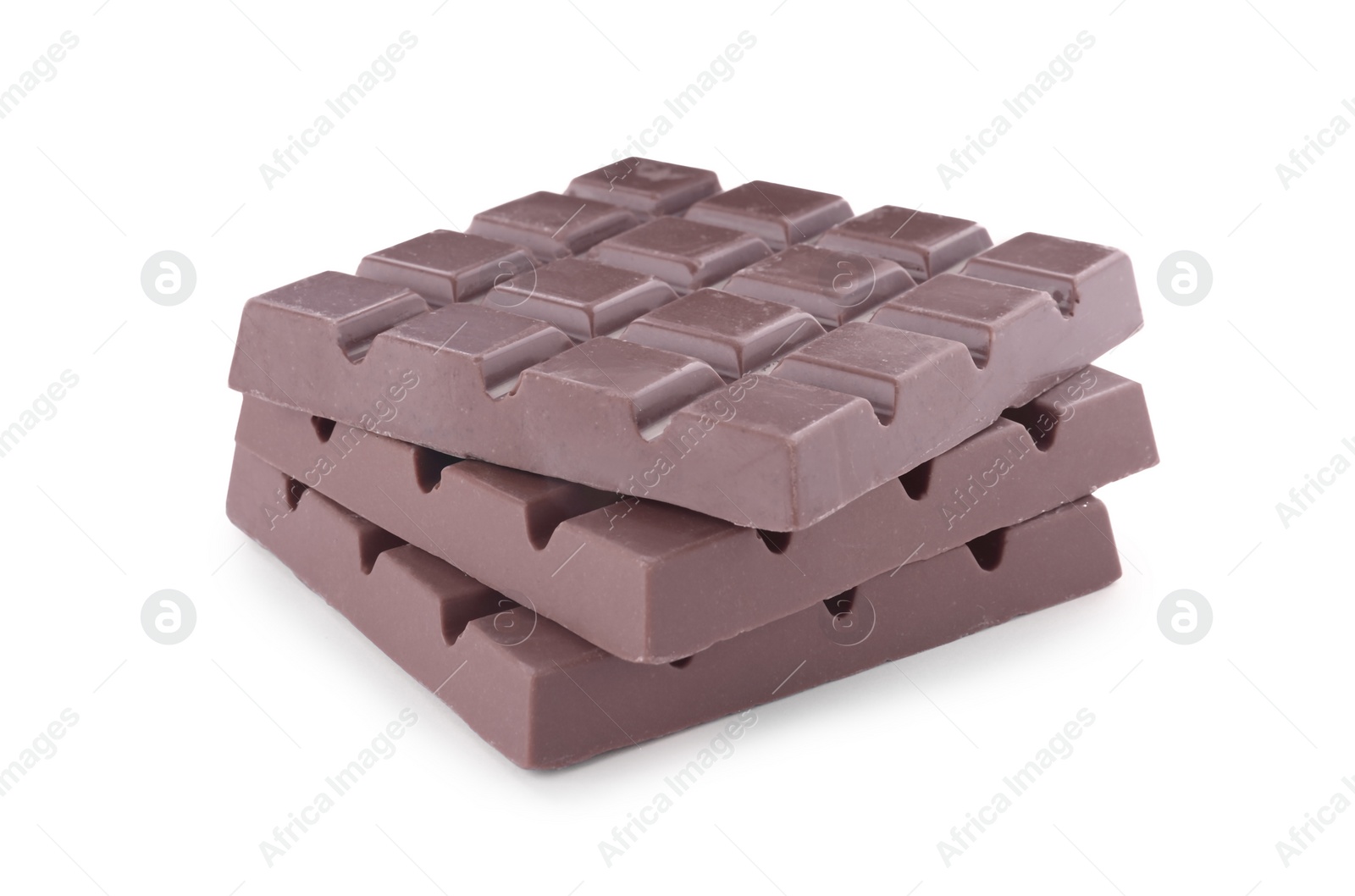 Photo of Delicious milk chocolate bars isolated on white