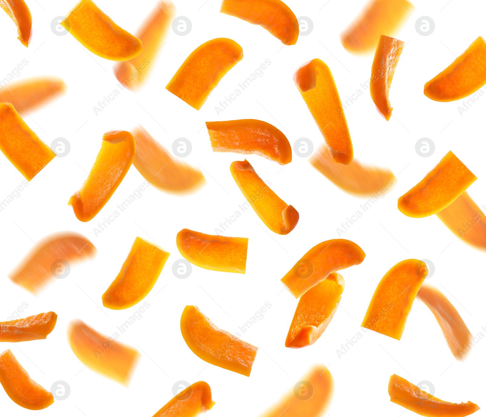 Image of Falling cut orange bell peppers on white background
