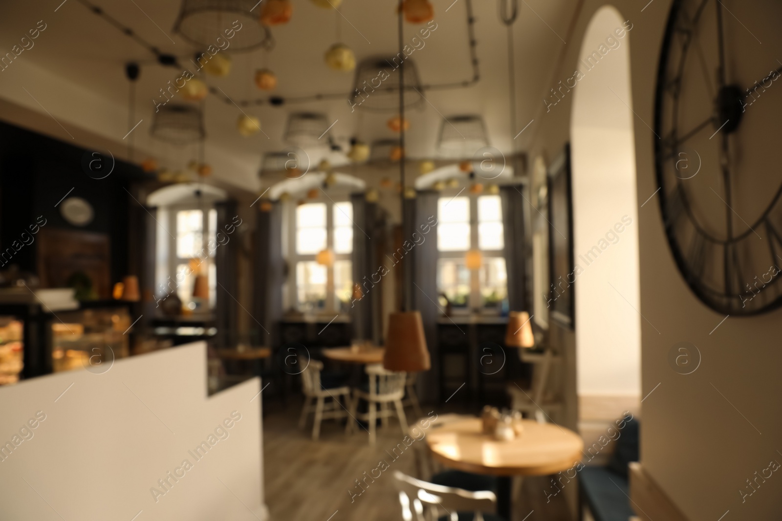 Photo of Blurred view of stylish modern cafe interior