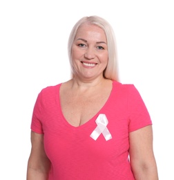Photo of Mature woman with silk ribbon on white background. Breast cancer awareness concept
