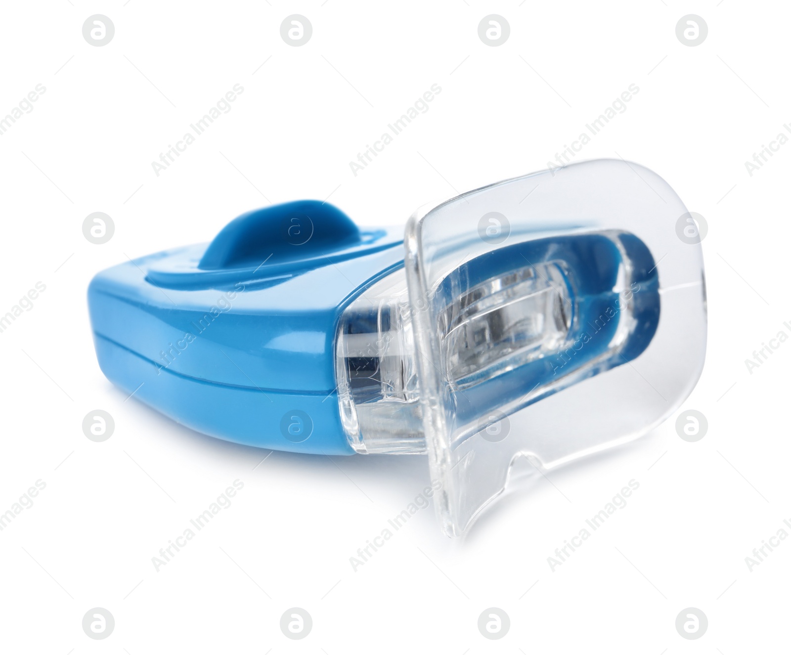 Photo of Tooth whitening device on white background. Dental care