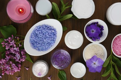 Photo of Flat lay composition with homemade cosmetic products and fresh ingredients on wooden table