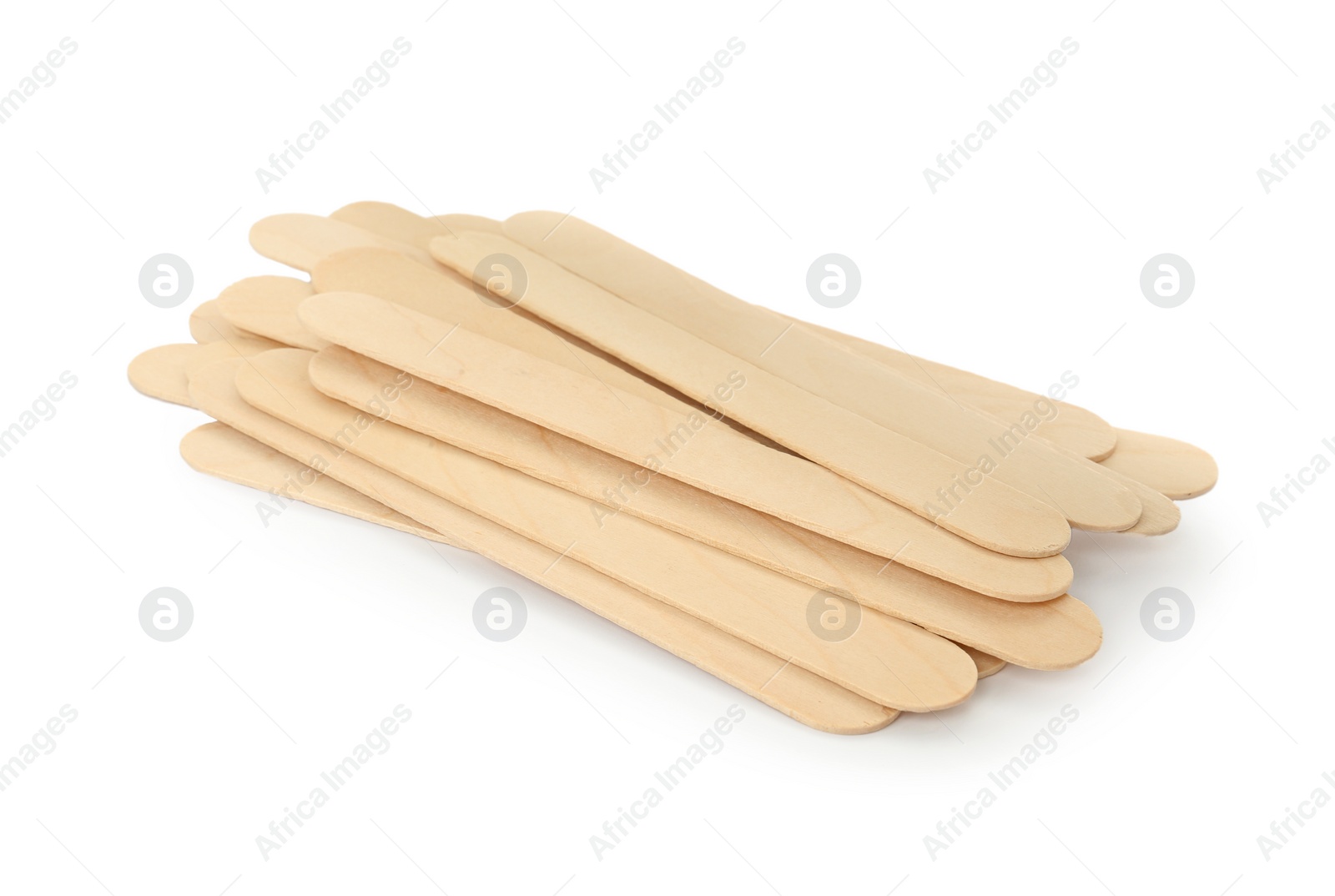 Photo of Disposable wooden spatulas for depilatory wax on white background