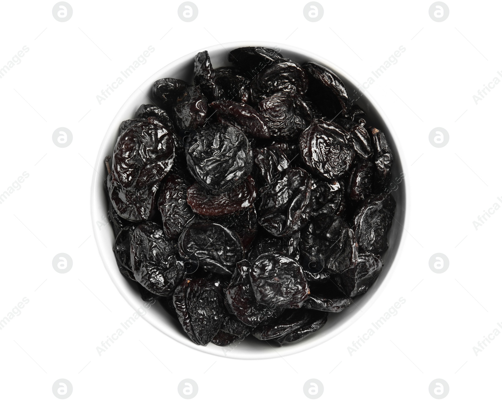 Photo of Bowl of tasty prunes on white background, top view. Dried fruit as healthy snack