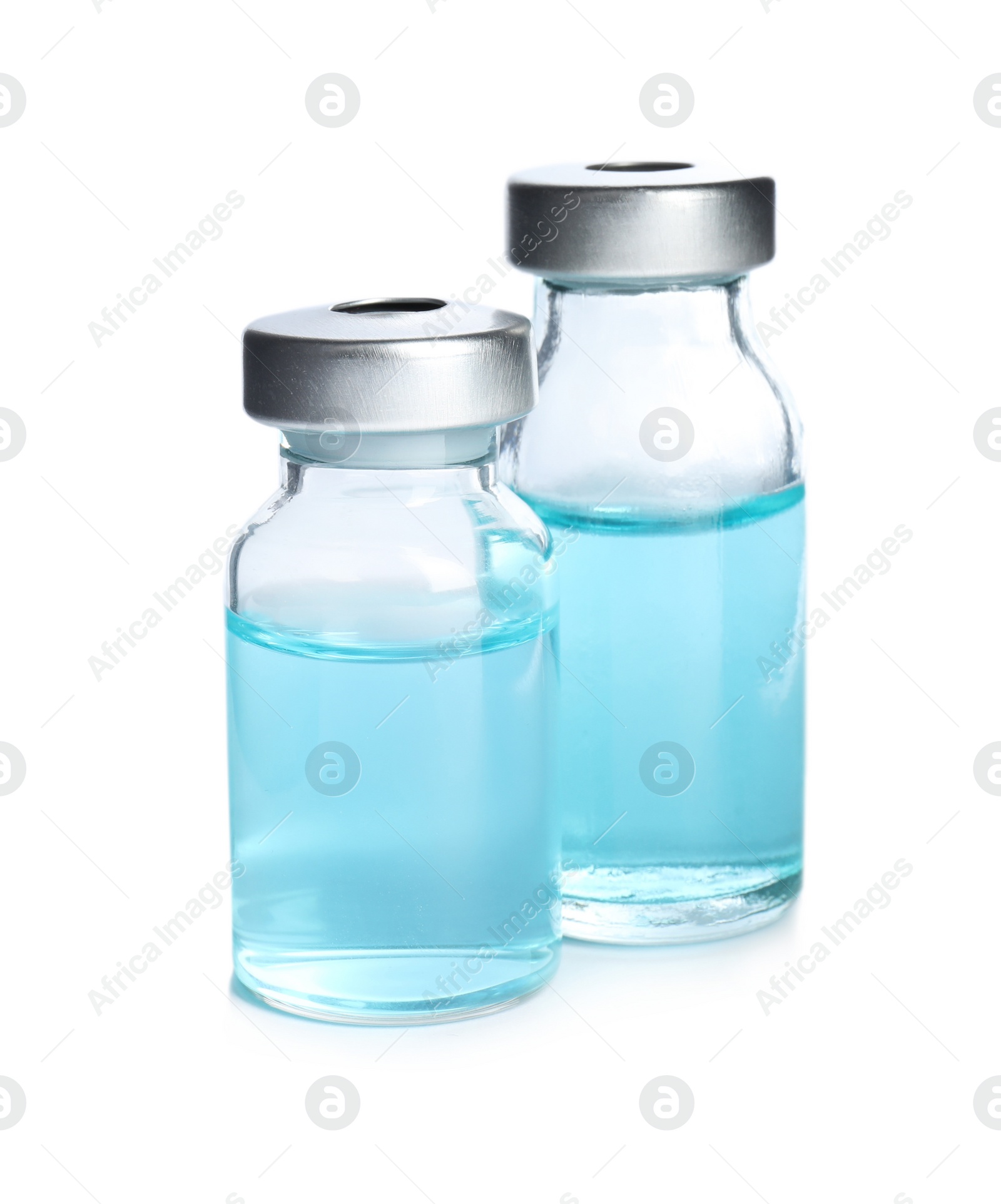 Photo of Vials with medication on white background. Vaccination and immunization