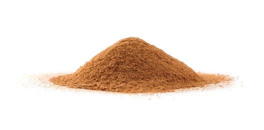 Photo of Pile of dry aromatic cinnamon powder isolated on white