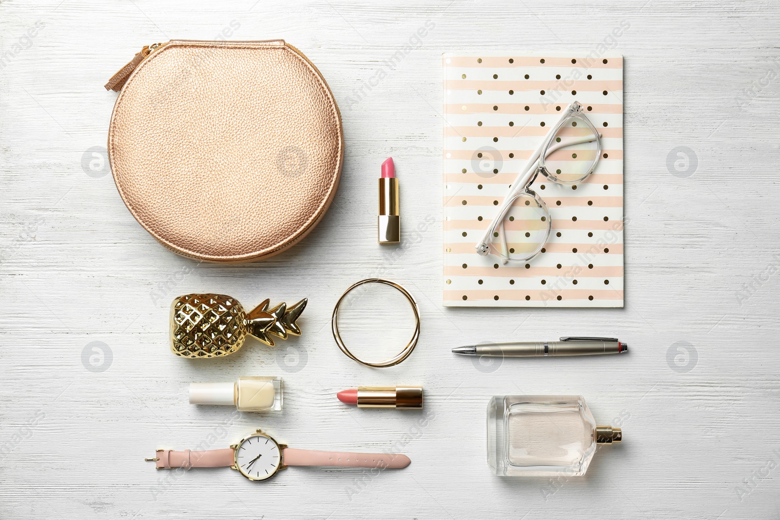 Photo of Set of accessories, cosmetics and perfume on wooden background, flat lay