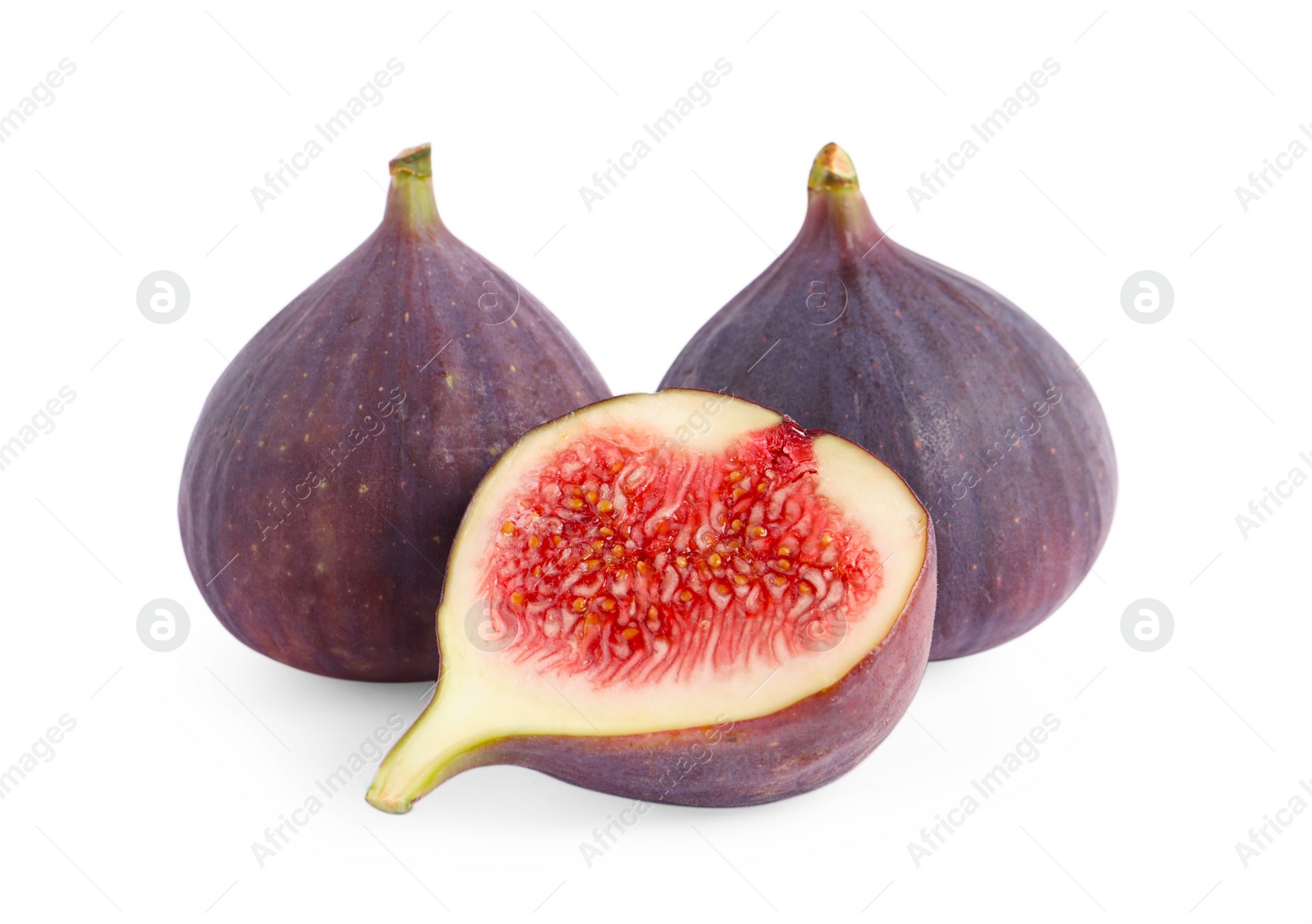 Photo of Whole and cut ripe figs isolated on white