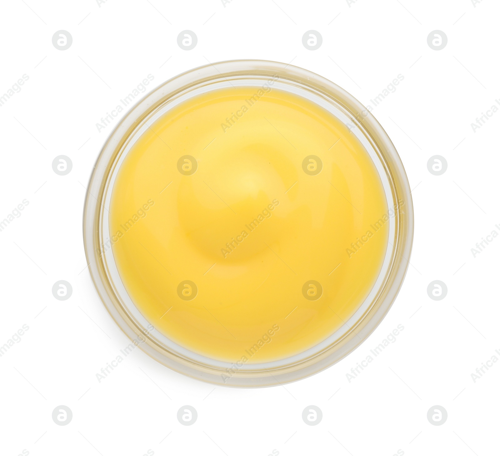 Photo of Delicious cheese sauce in bowl isolated on white, top view