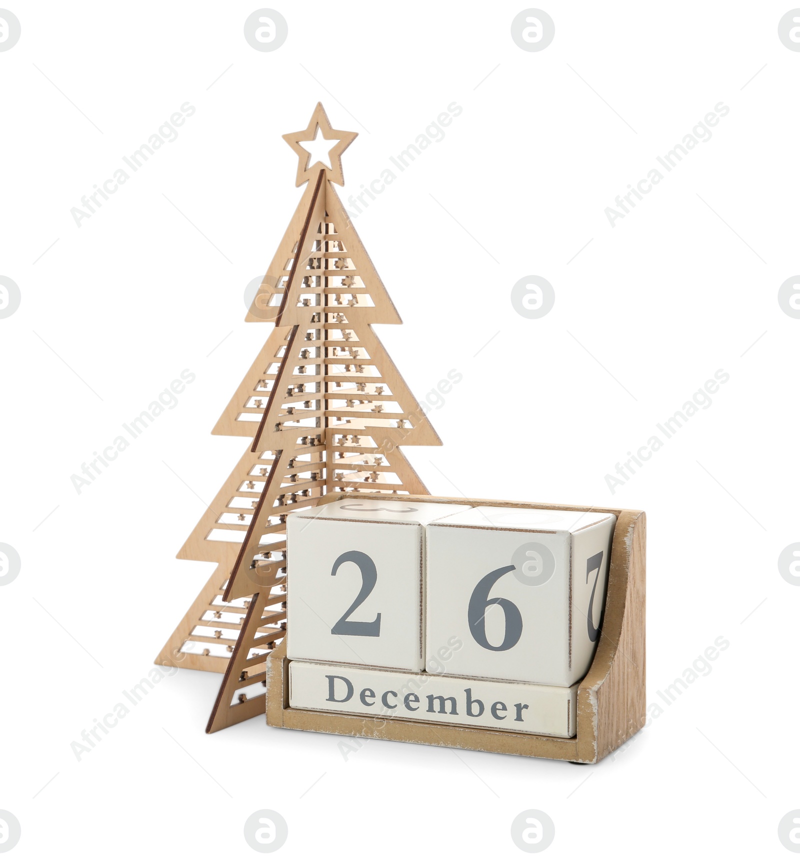 Photo of Wooden block calendar with date 26th of December near decorative Christmas tree on white background. Boxing day