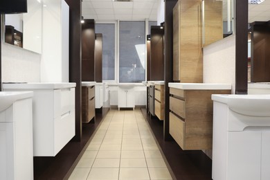 Assortment of bathroom vanity units in store